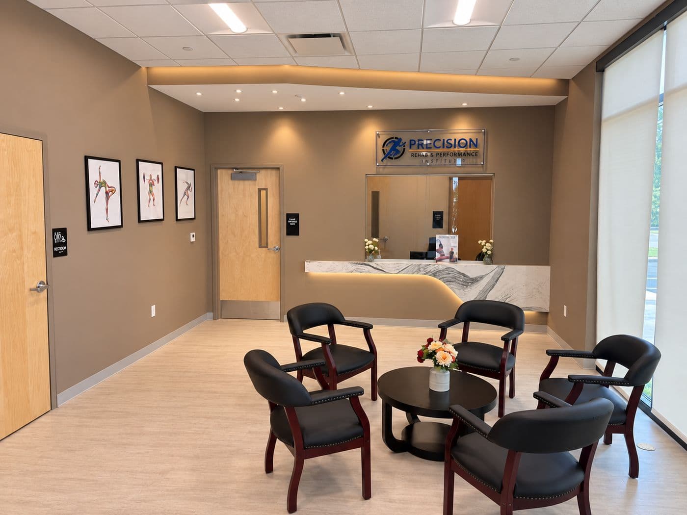 The waiting area, with seating and the reception desk beyond